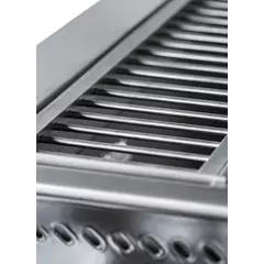 Open grill with refractory brick base